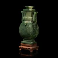 A Chinese Spinach Jade Archaistic Vase and Cover 碧玉雕饕餮紋仿古蓋瓶 帶木座