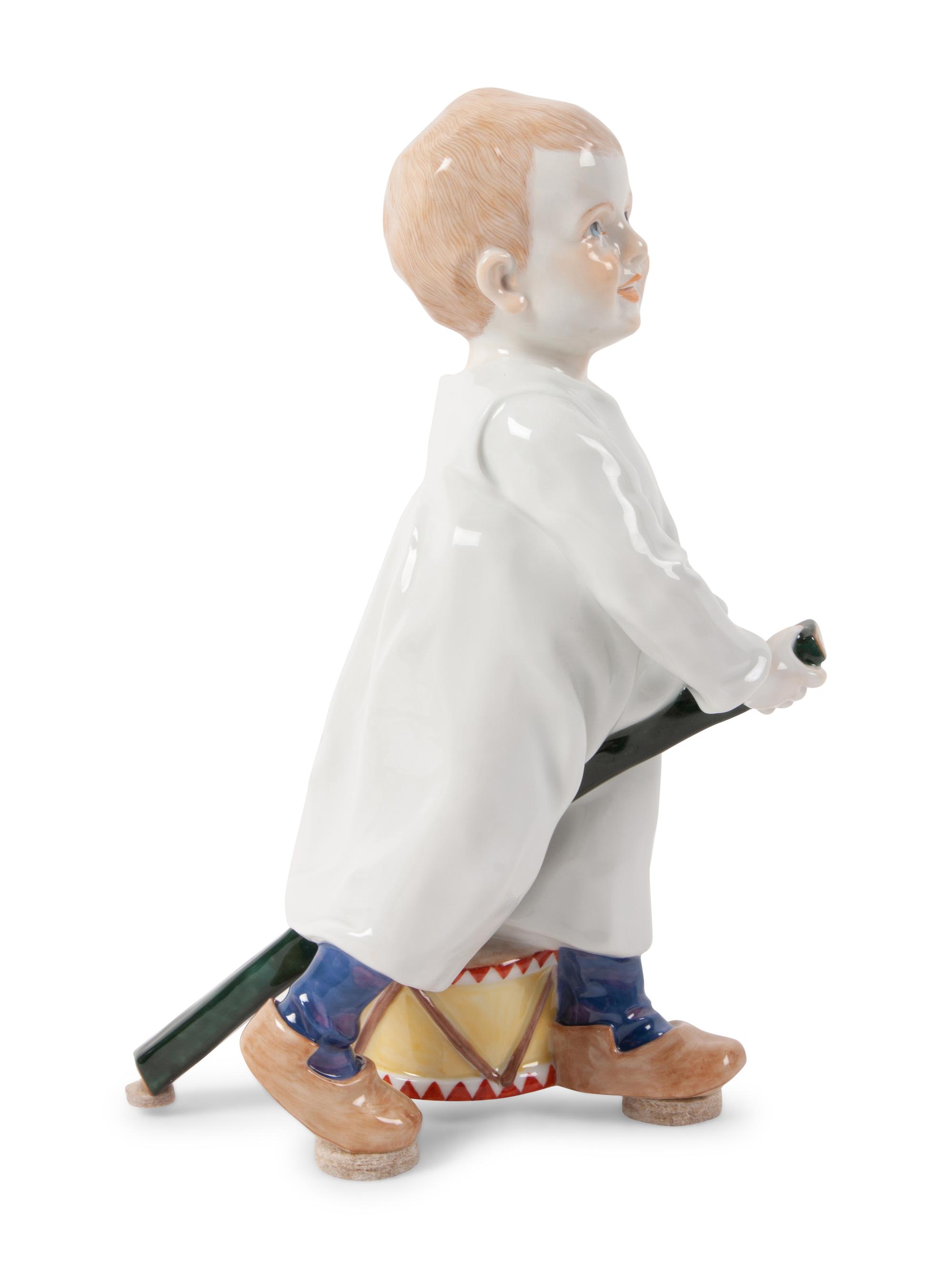 A Meissen Porcelain Figure of a Boy with Drum, by Konrad Hentschel