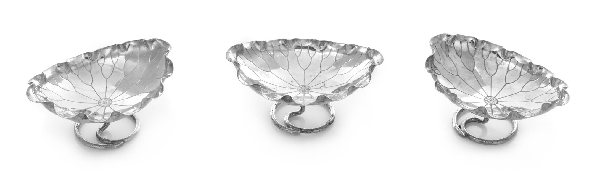 A Set of Three Chinese Export Silver Salts, Wang Hing & Co., Hong Kong, each in the form of a lily pad.