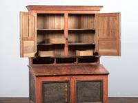 A Country Red and Grain Paint Decorated General Store Dry Goods Storage Cupboard