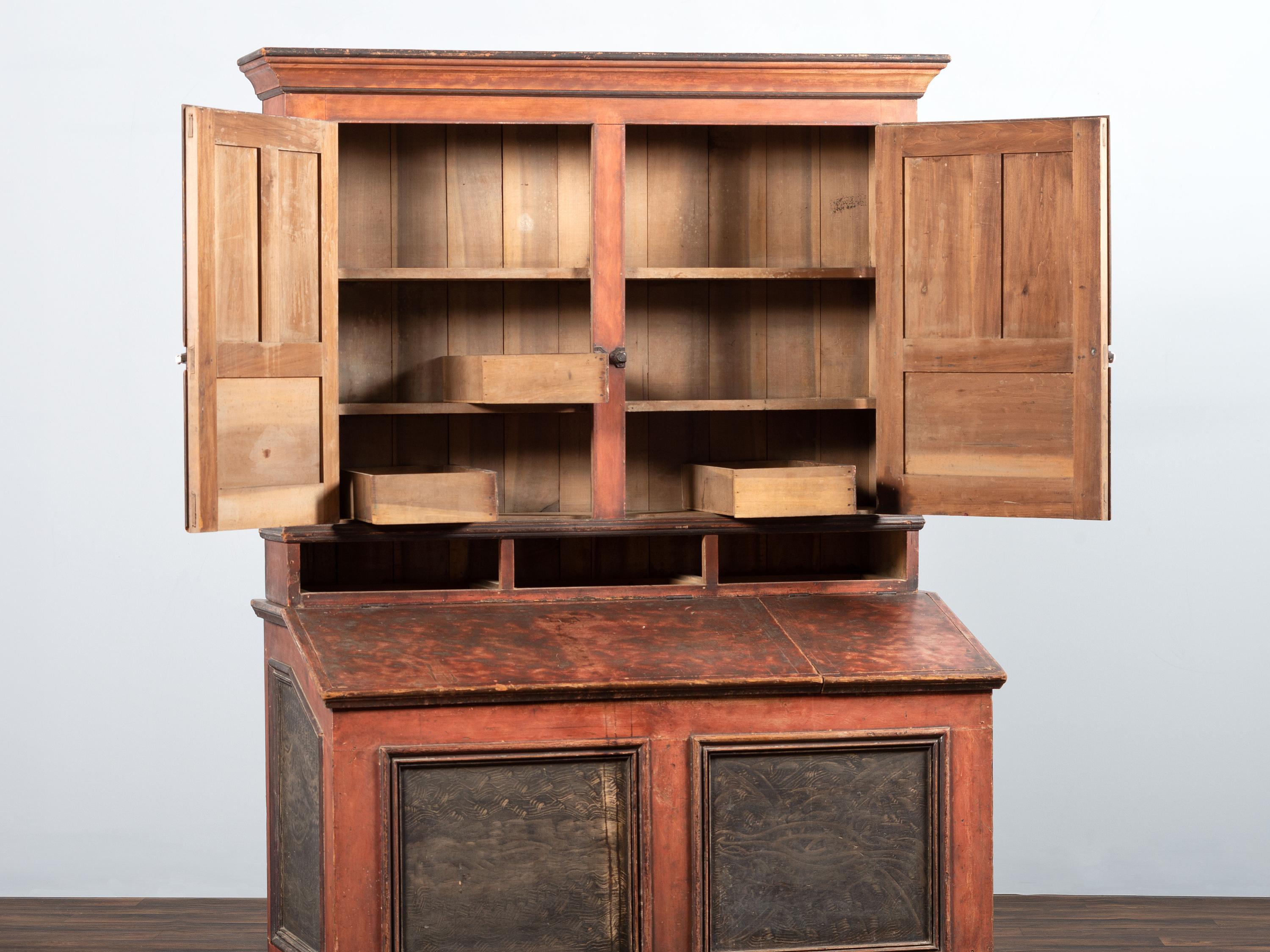 A Country Red and Grain Paint Decorated General Store Dry Goods Storage Cupboard