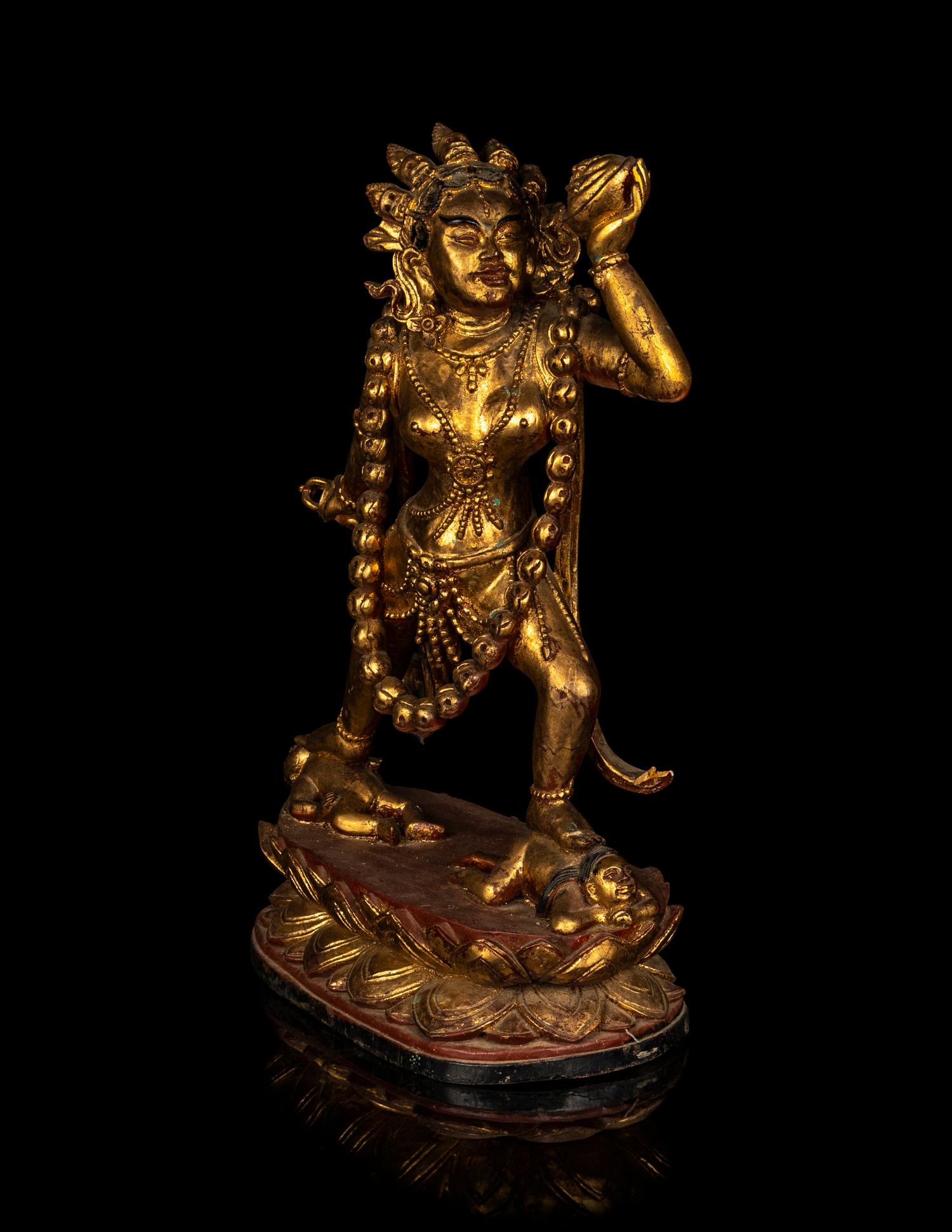 A Large Gilt and Red Lacquered Wood Figure of Vajrayogini