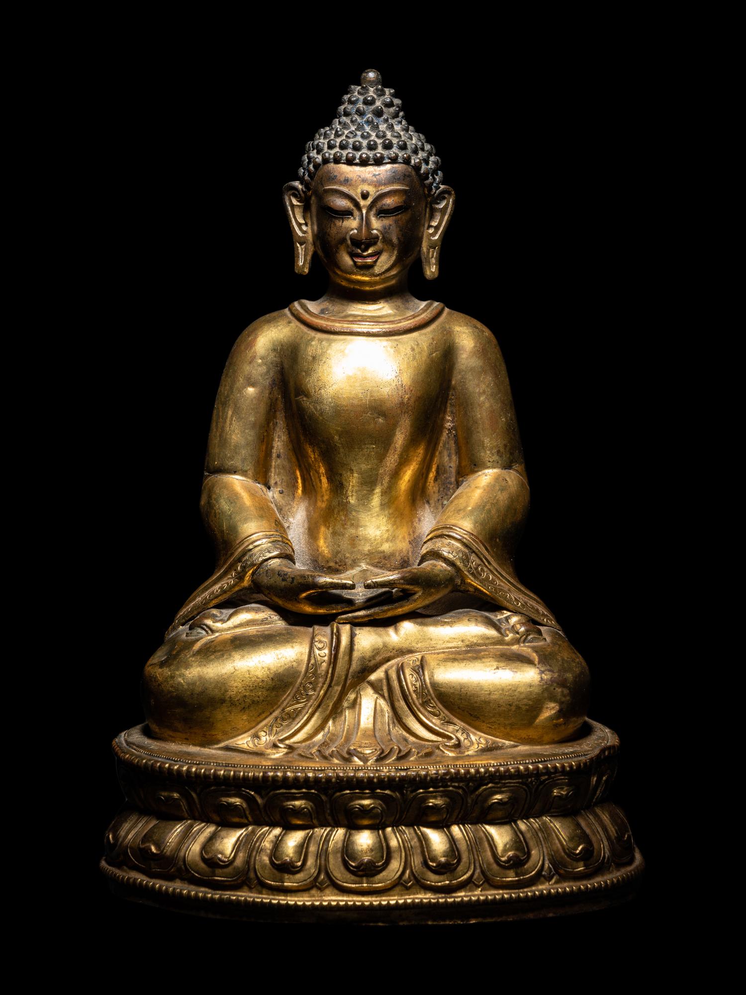 A Large Tibetan Gilt Bronze Figure of Seated Buddha