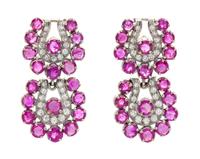 A White Gold, Ruby and Diamond Demi Parure, 66.20 dwts.