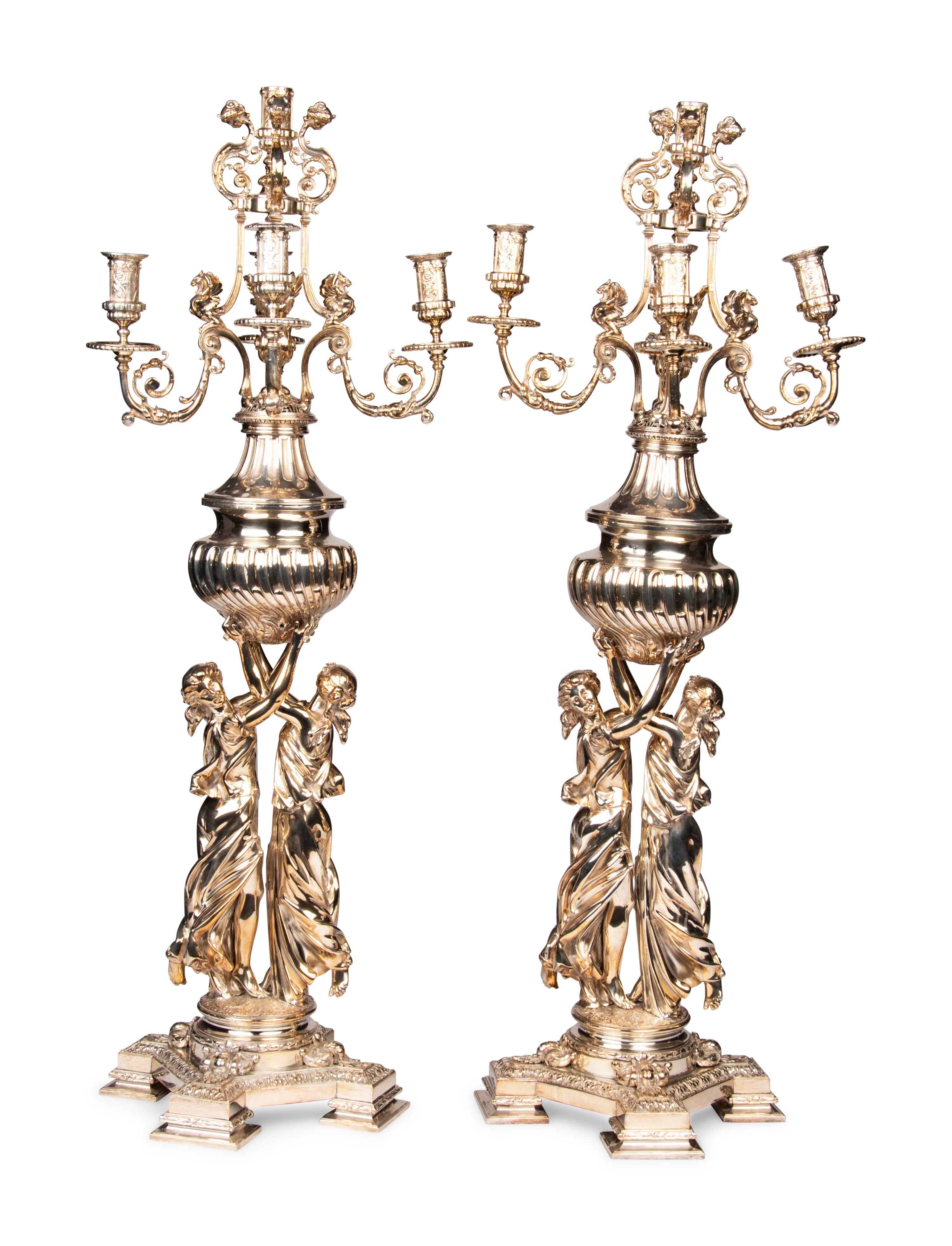 A Pair of Monumental Silver-Plate Figural Six-Light Candelabra