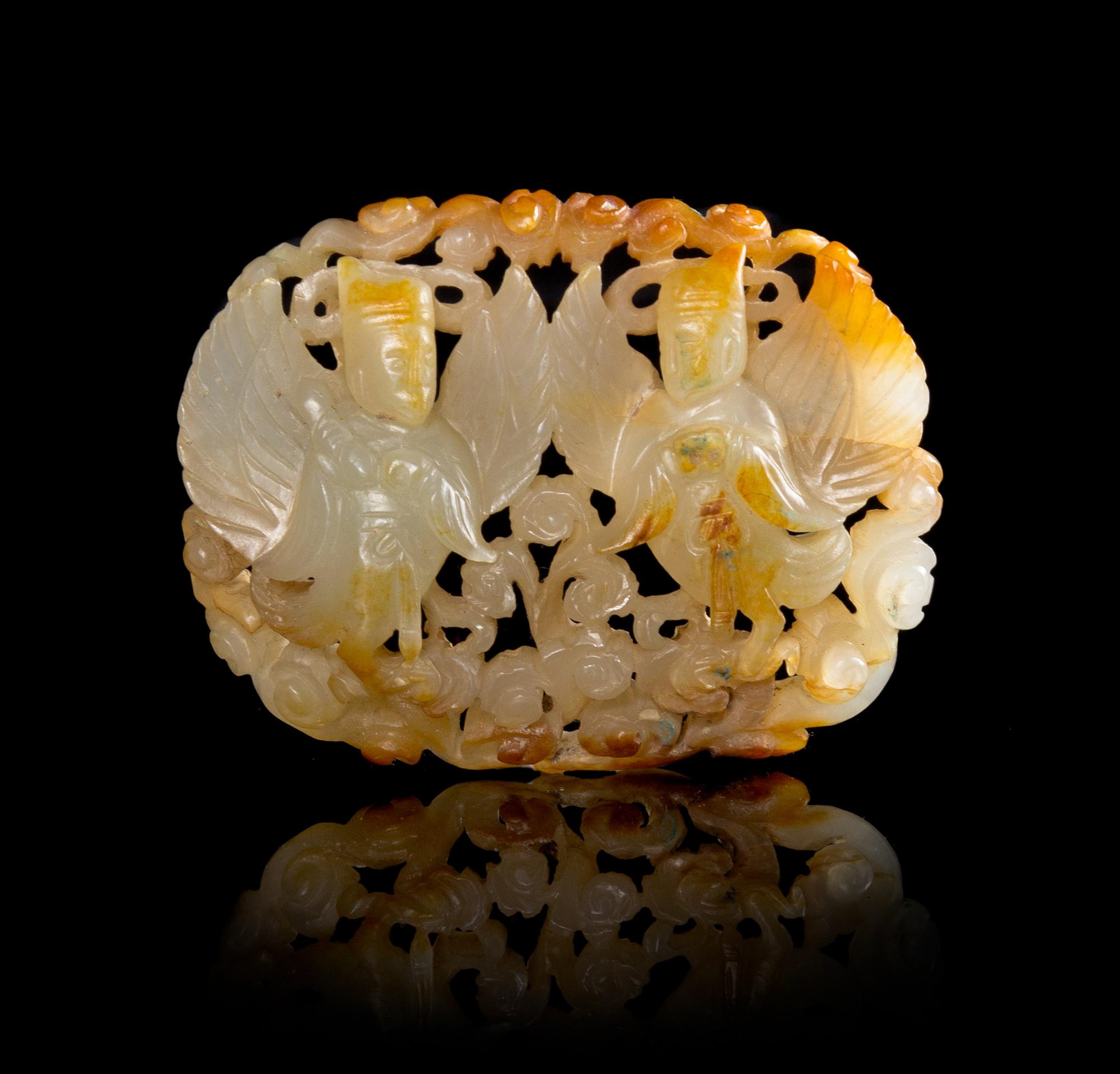 A Yellow Jade Plaque Length 2 1/2 inches.