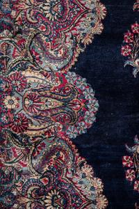 A Kirman Wool Rug