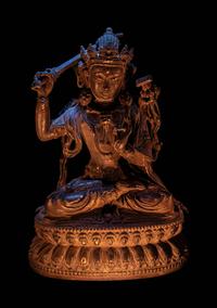 A Sino-Tibetan Parcel-Gilt Bronze Figure of Manjushri