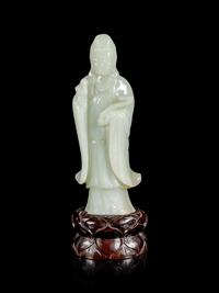 A Pale Celadon Jade Figure of Guanyin