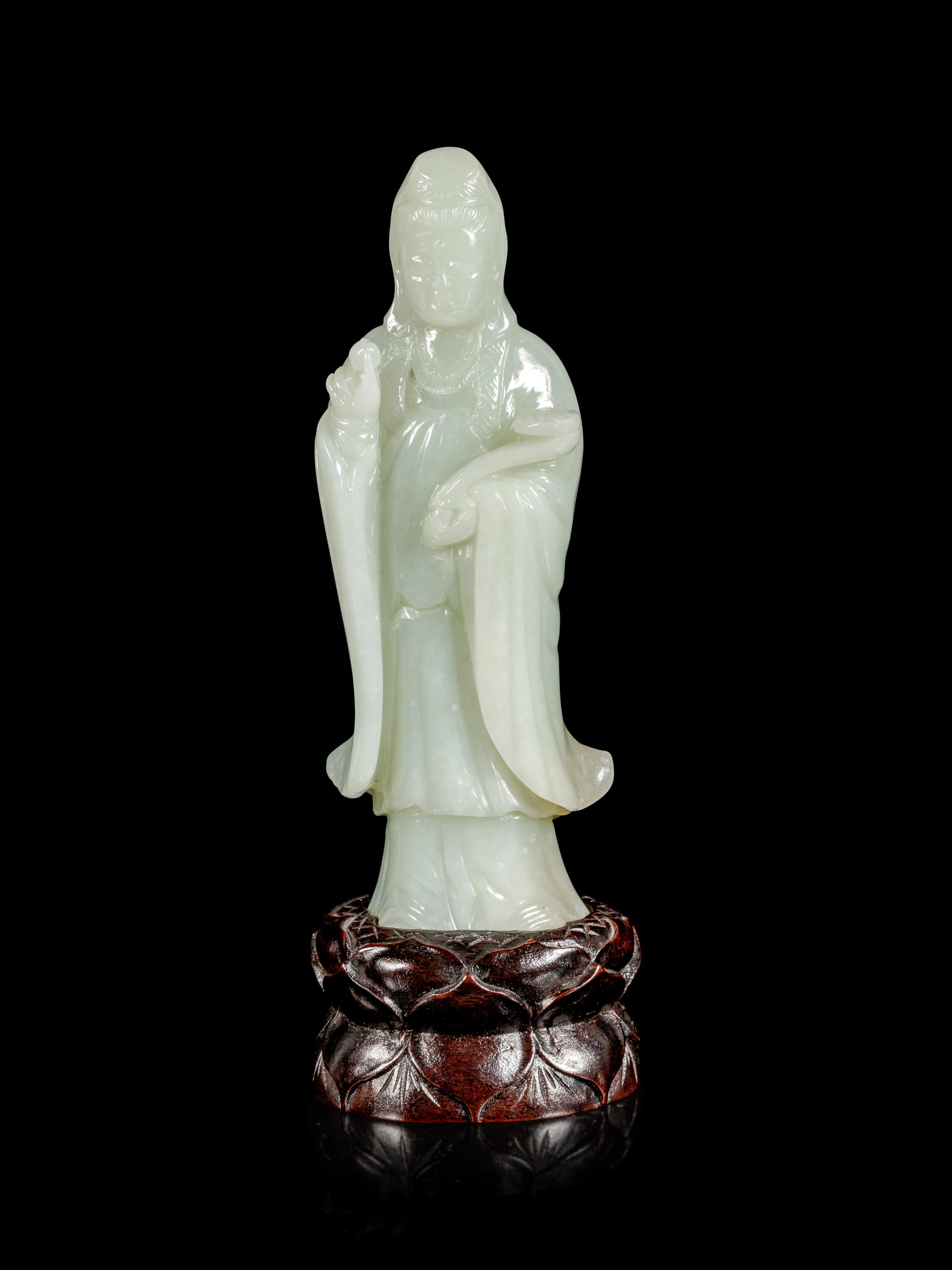A Pale Celadon Jade Figure of Guanyin