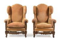 A Pair of Queen Anne Style Wingback Chairs