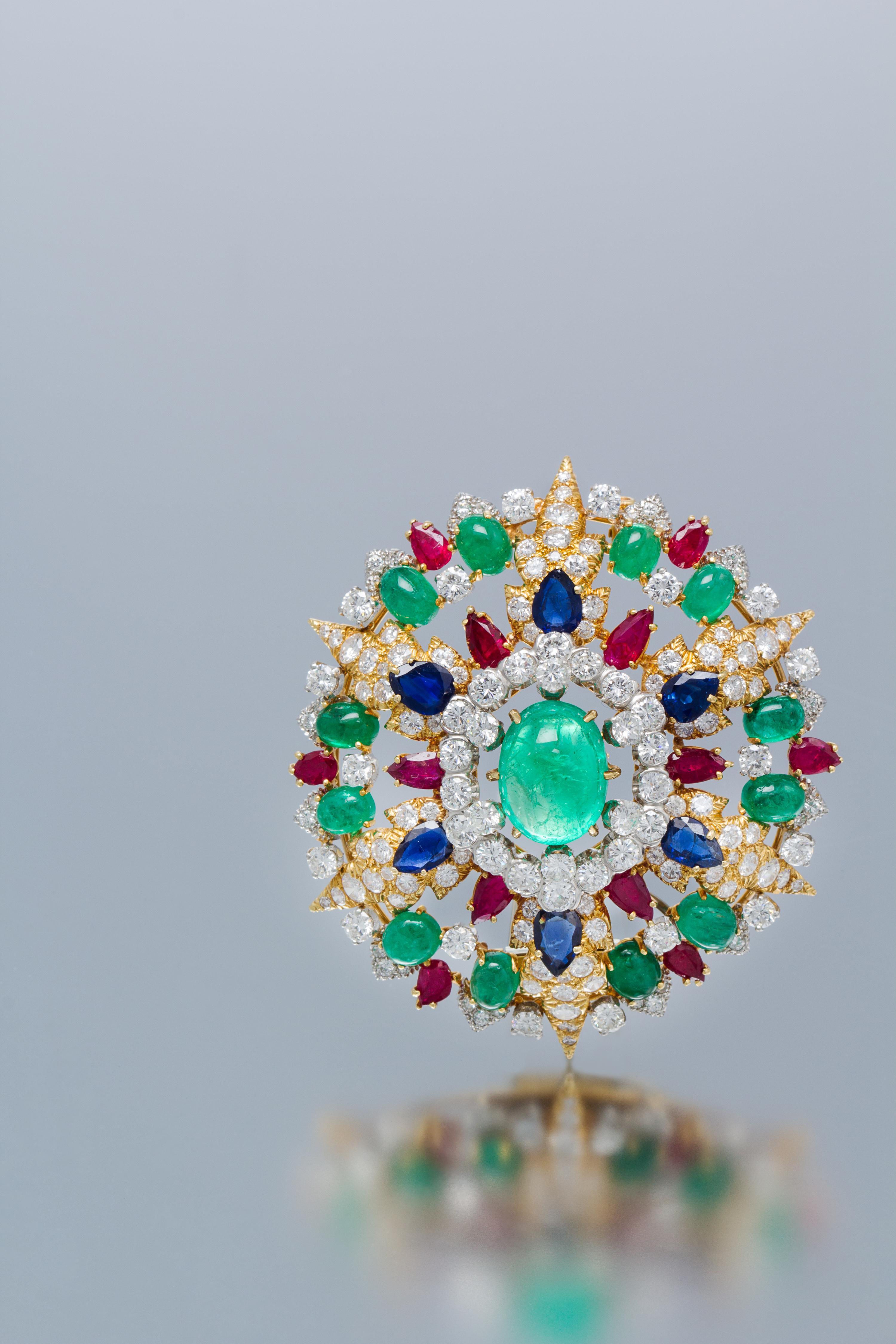 An 18 Karat Yellow Gold, Platinum, Emerald, Ruby, Sapphire and Diamond Pendant/Brooch, David Webb, Circa 1960, 33.10 dwts.