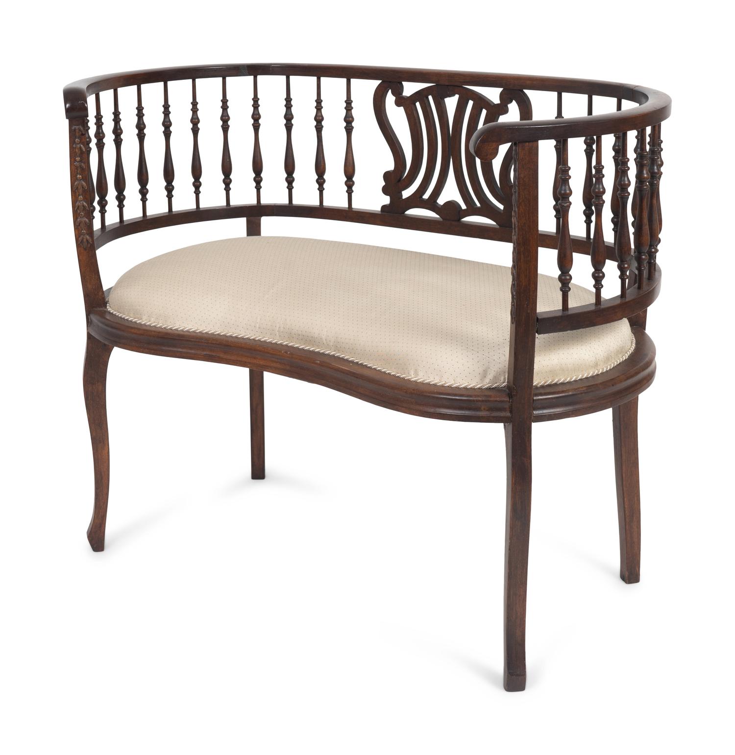 An Edwardian Mahogany Settee — EARLY 20TH CENTURY