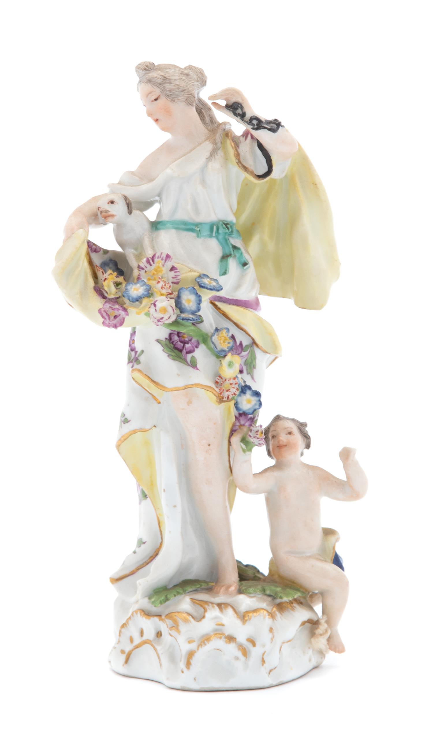 A Meissen Porcelain Figure of Woman with Monkey and Putto Height 6 1/8 inches. — 18TH CENTURY