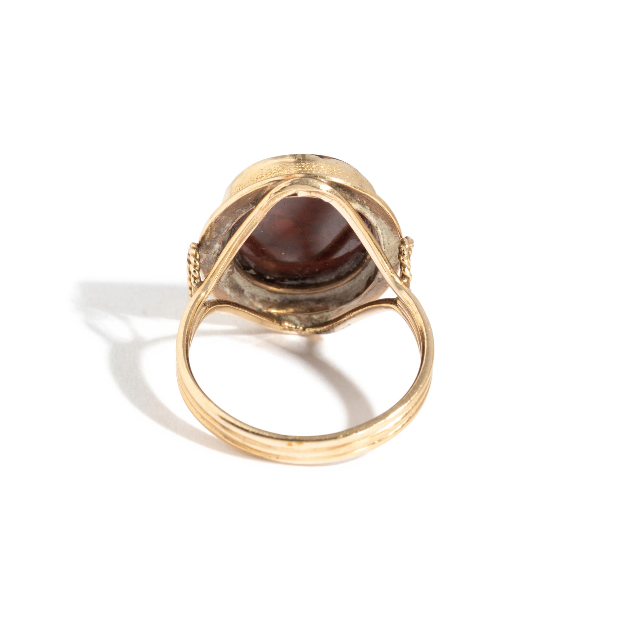 A Neoclassical Gold and Carnelian Finger Ring with a Head of Medusa