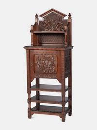 with carved floral and butterfly motifs