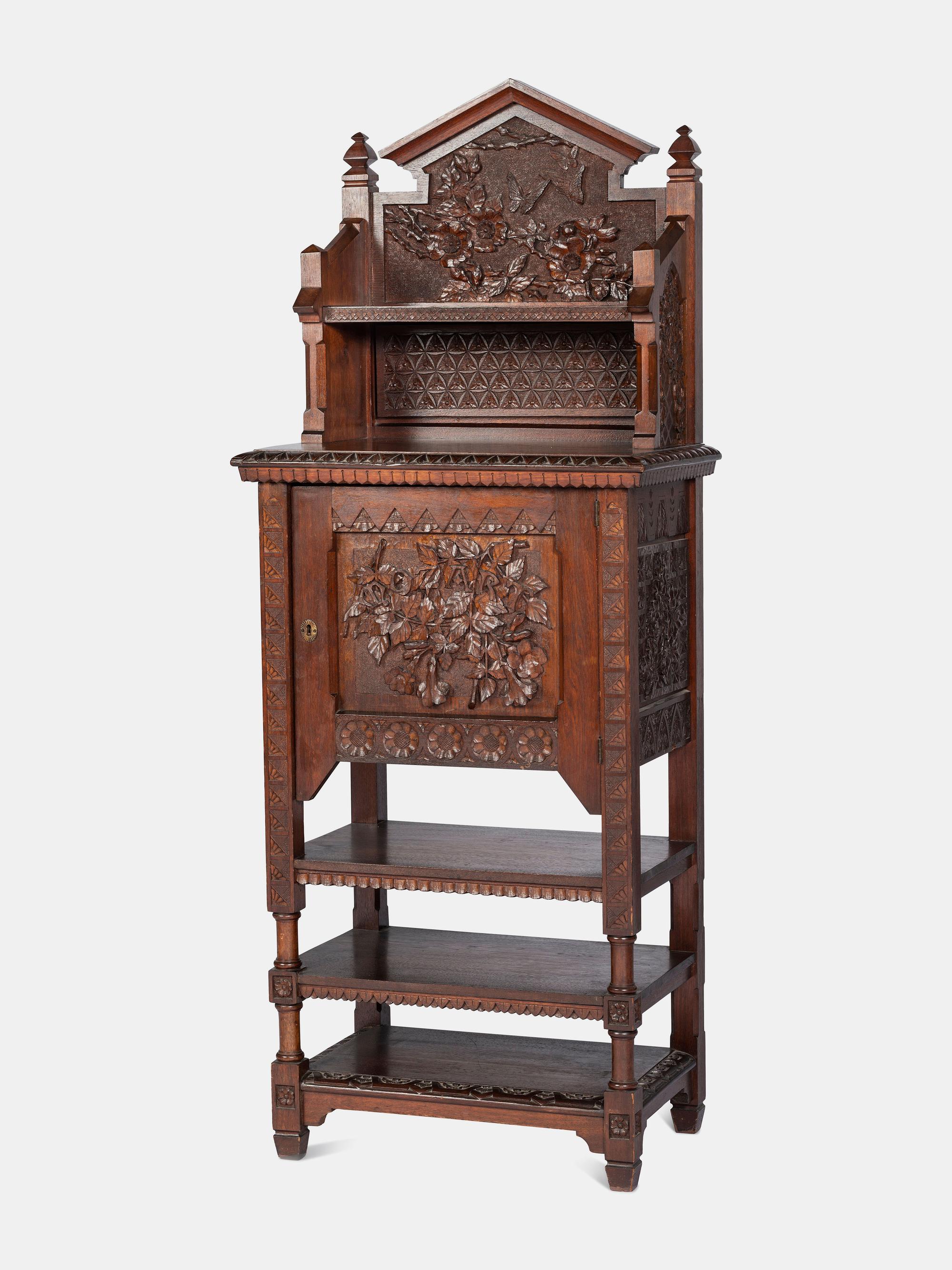 with carved floral and butterfly motifs
