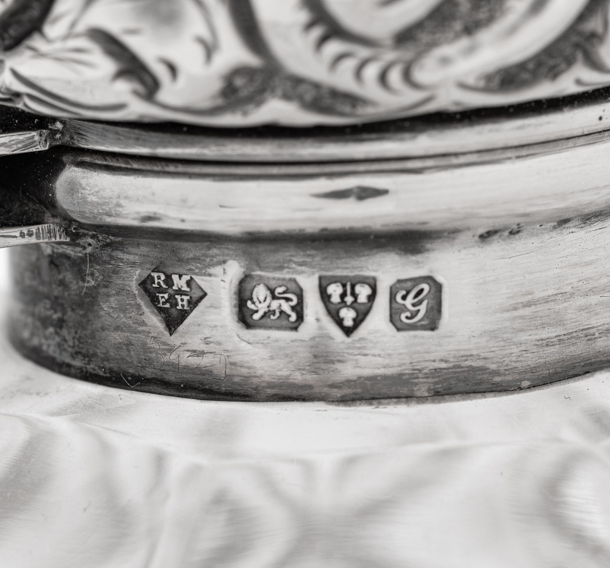 Four English Silver Mounted Cut Glass Bottles
