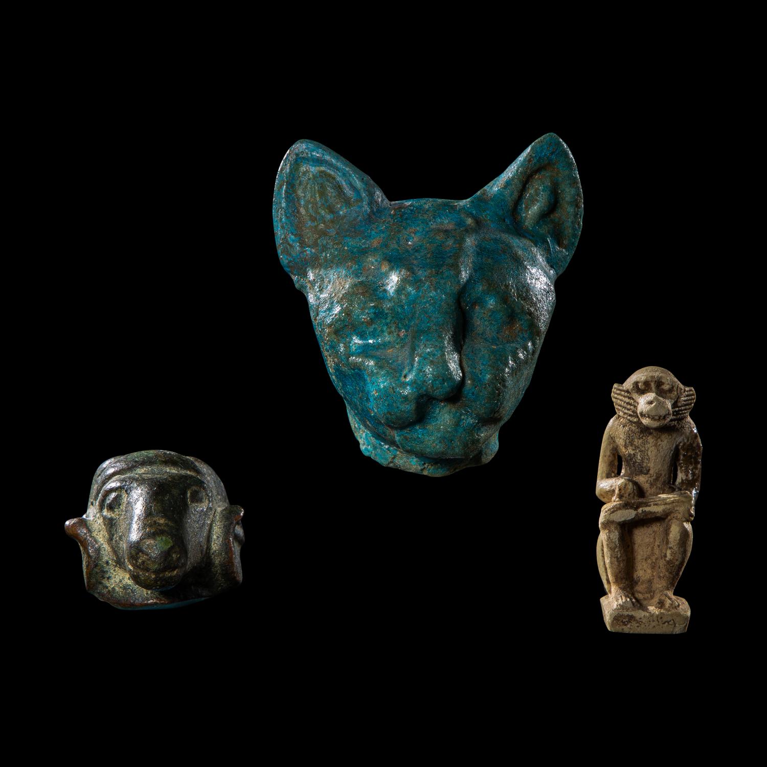 Three Egyptian Bronze and Faience Amulets