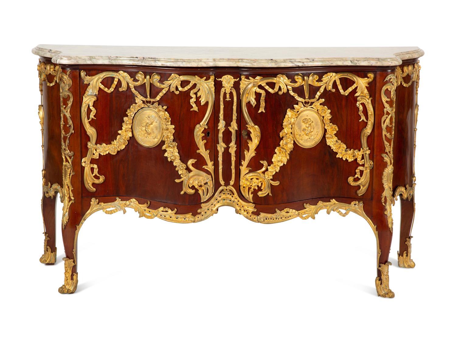 A Régence Style Gilt Bronze Mounted Mahogany Marble-Top Commode — Early 20th century