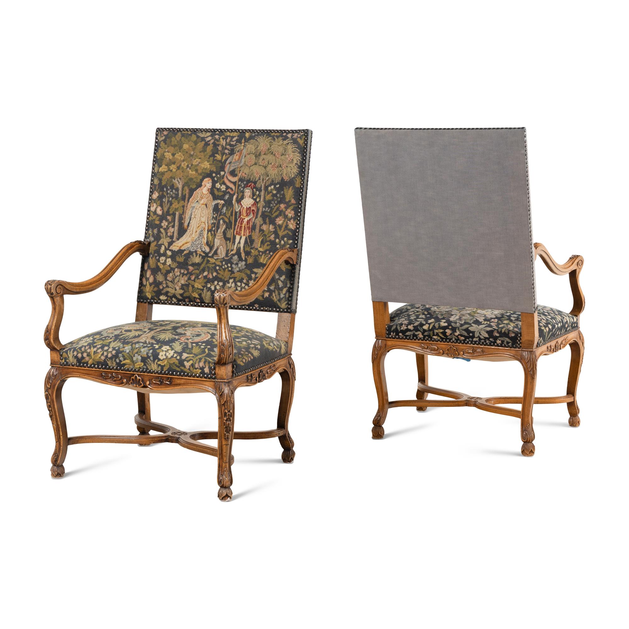A Pair of Régence Style Walnut Armchairs