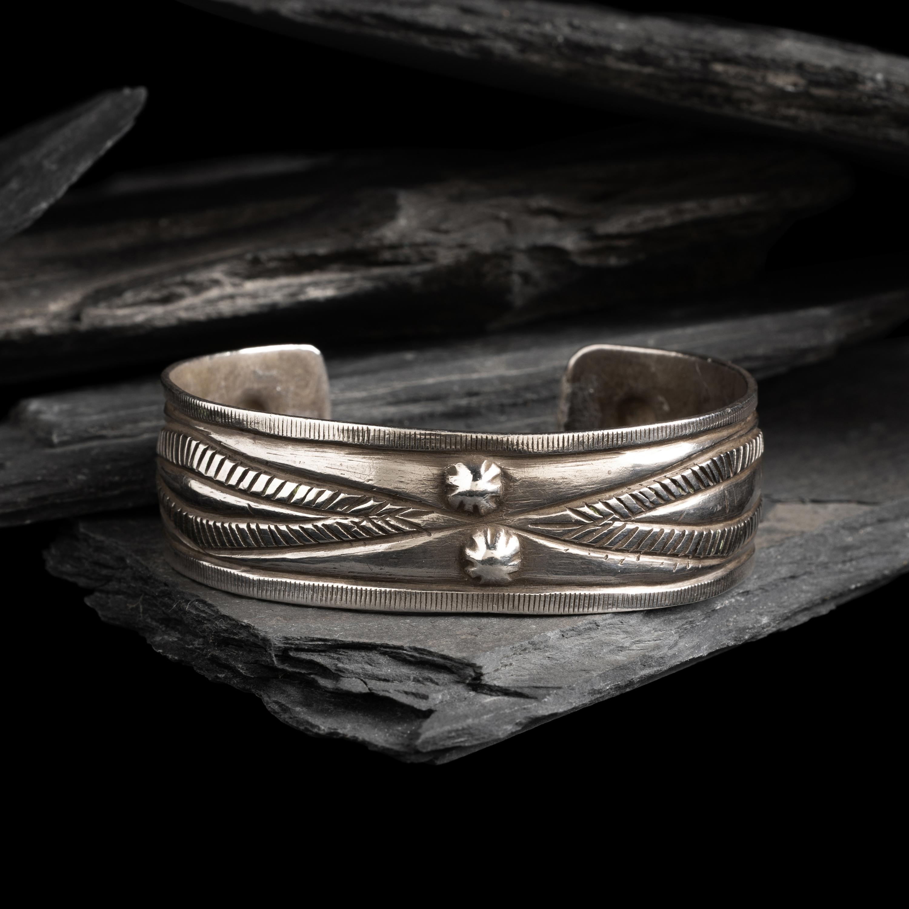 Early Navajo Chiseled Cuff Bracelet, with Repoussé Elements