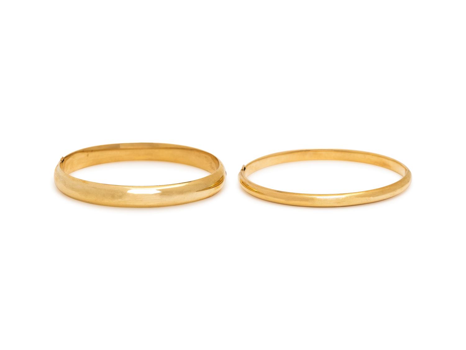 TWO YELLOW GOLD BANGLE BRACELETS