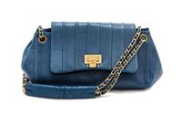 A Chanel Blue Calfskin Leather Accordian Flap Handbag, 9" x 5" x 4".