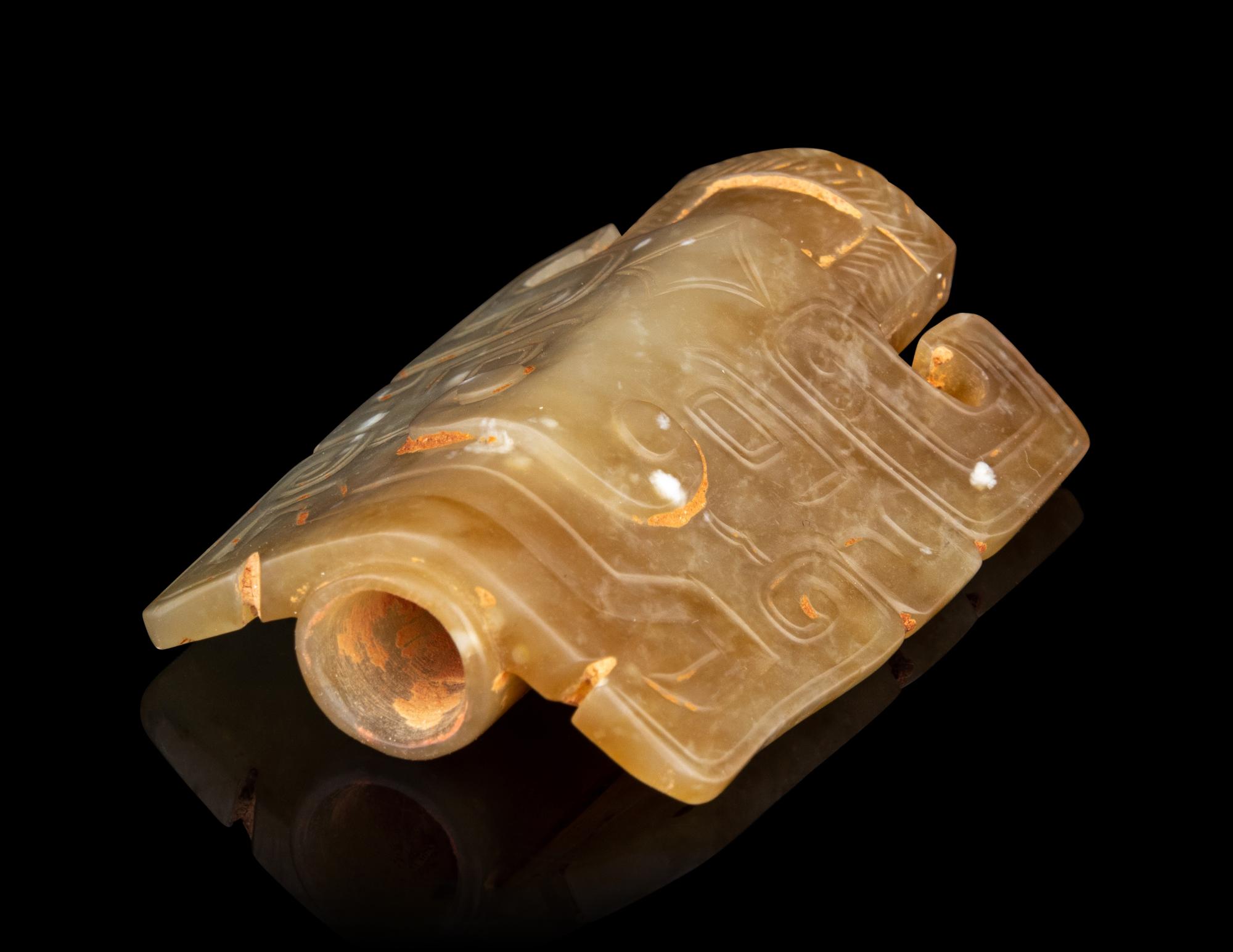 A Small Archaistic Jade Mask-Form Ornament