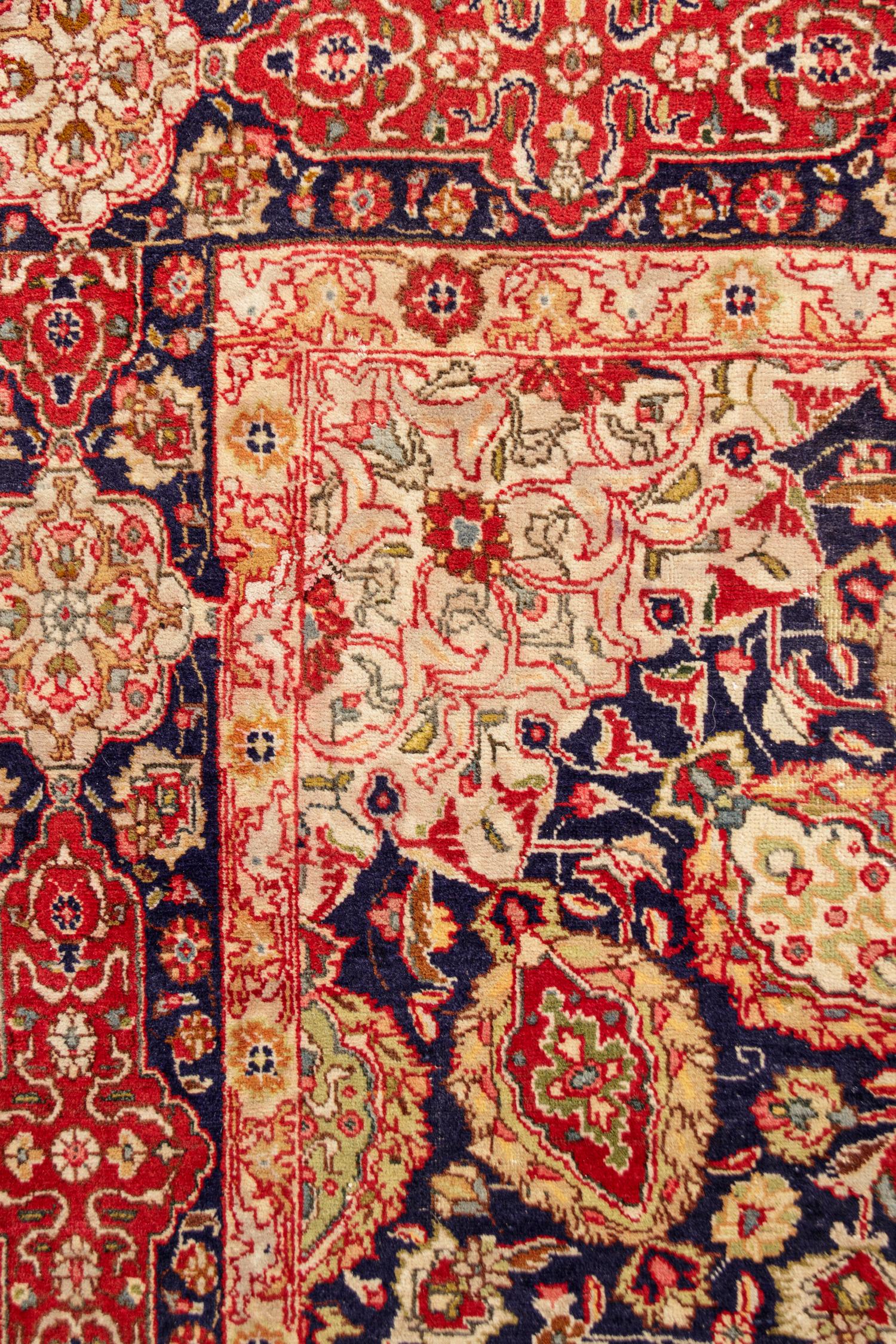 A Kashan Wool Rug