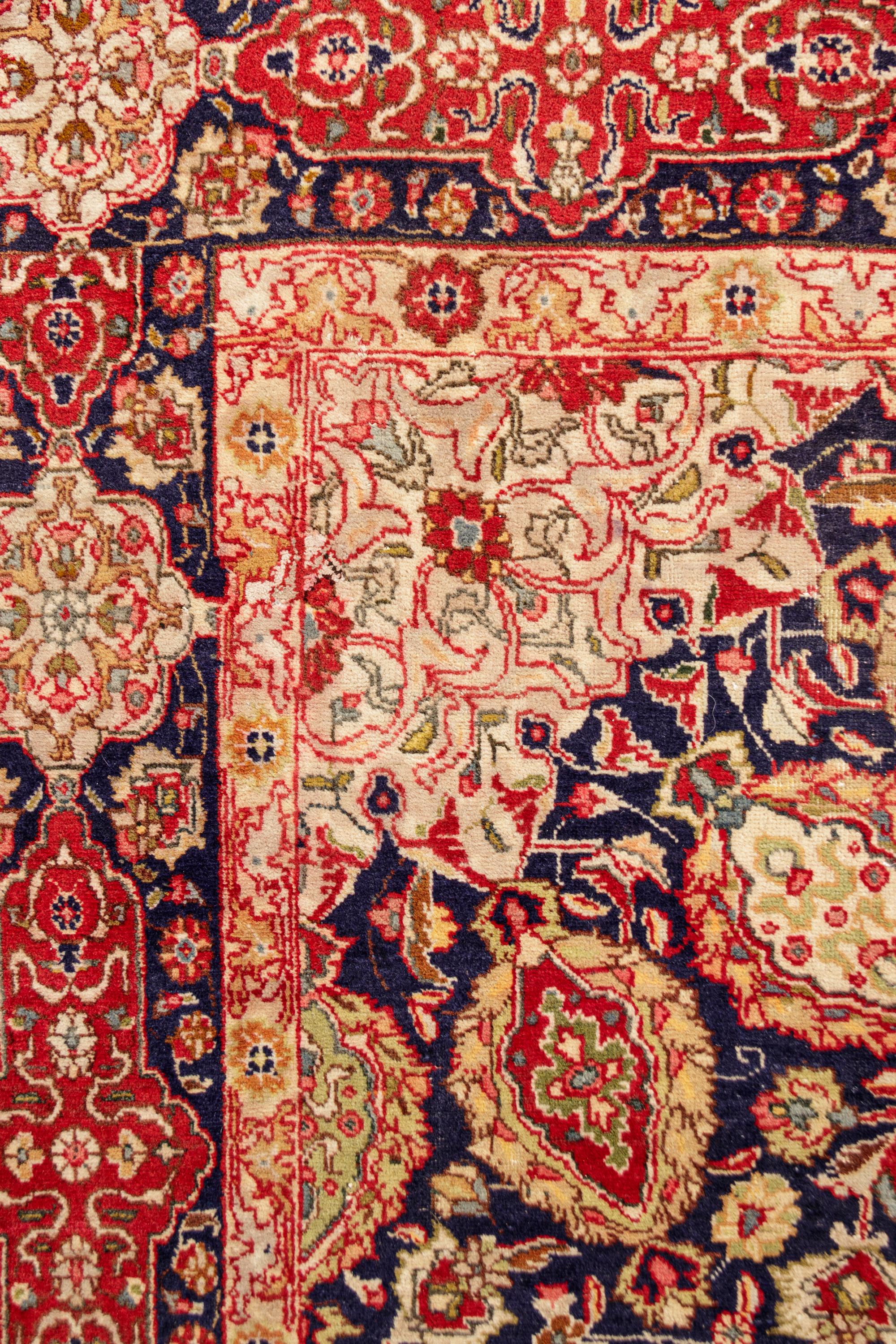 A Kashan Wool Rug