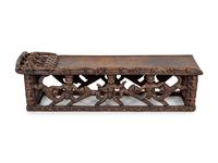 A Bamileke/Bamun Carved Wood Bed