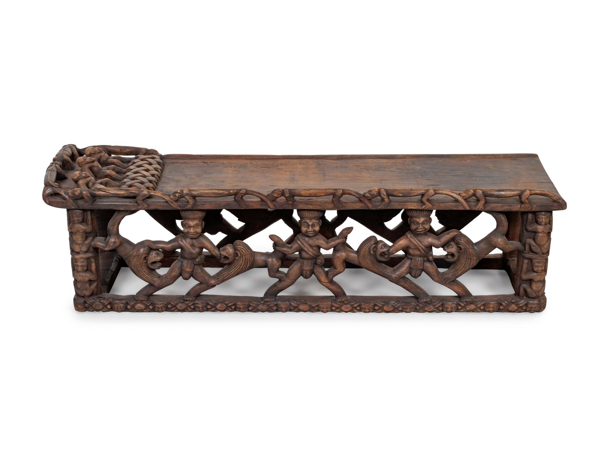 A Bamileke/Bamun Carved Wood Bed