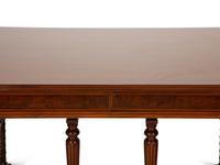 An English Renaissance Revival Carved Mahogany Library Table