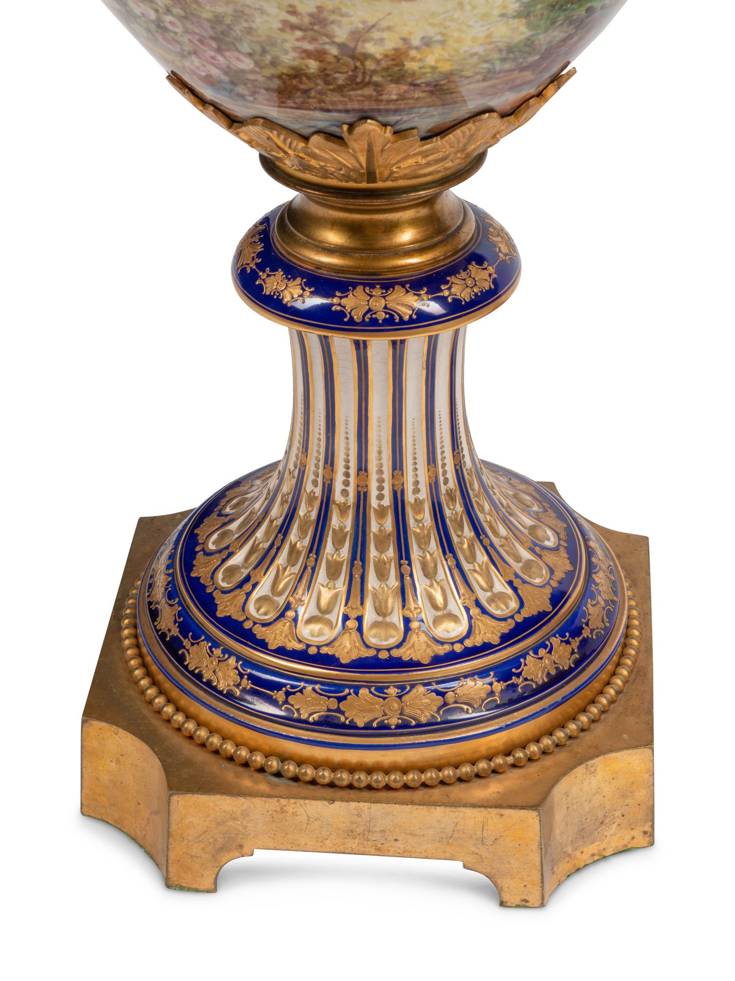 A Pair of Large Gilt Bronze Mounted Sèvres Porcelain Vases