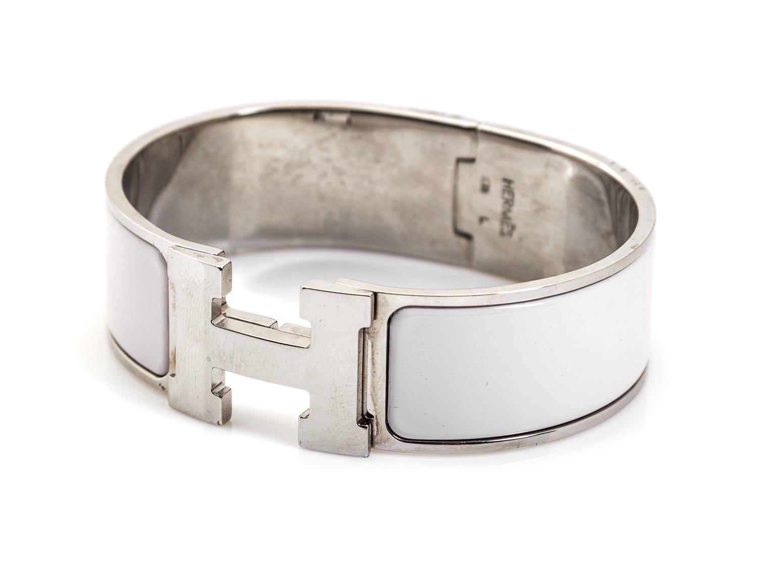 An Hermes Clic Clac White Enamel and Silver Bracelet, Size L.