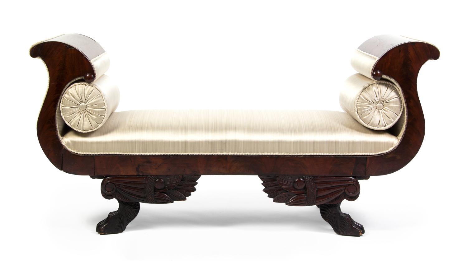 An American Classical Mahogany Window Bench, Width 61 inches.