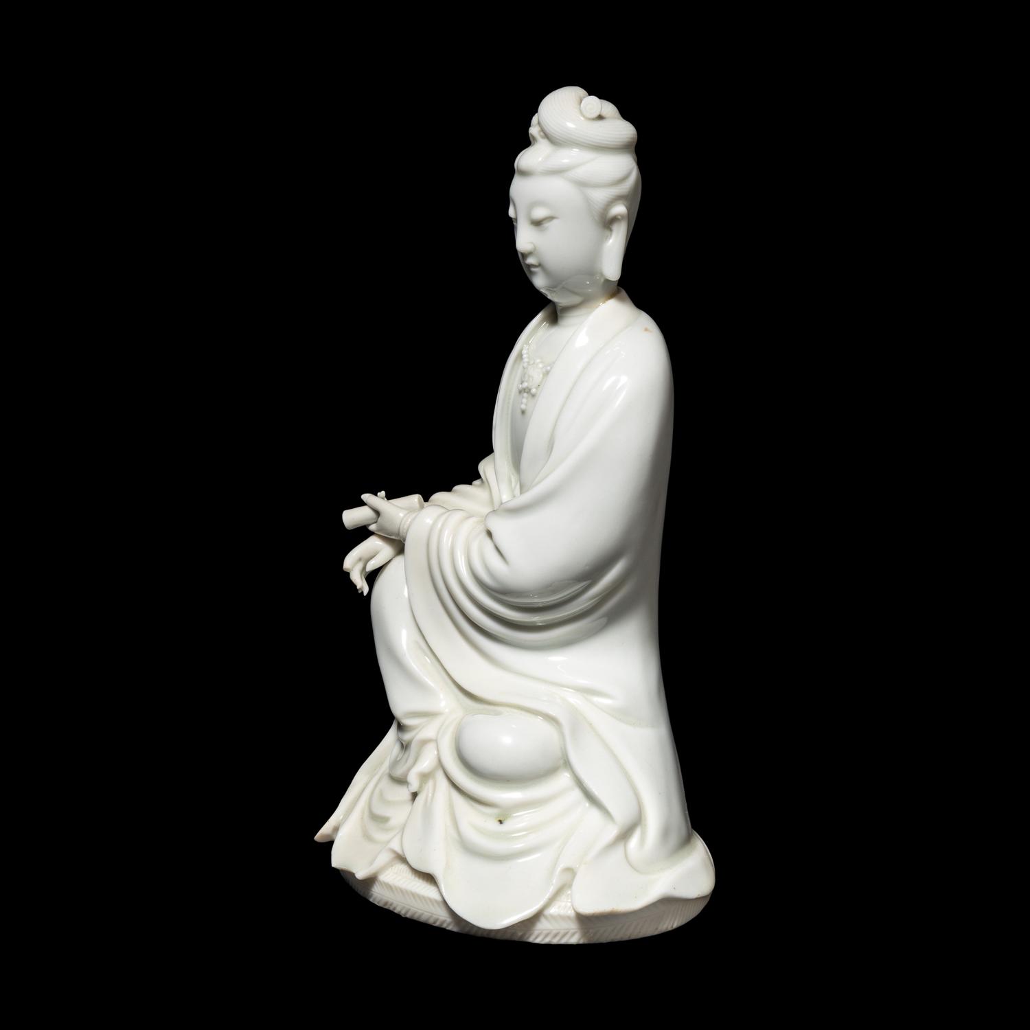 A Chinese Blanc-de-Chine Porcelain Figure of Guanyin, Late Qing/Republic Period 晚清/民國 德化白瓷書卷觀音