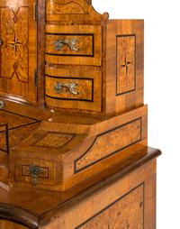 An Austrian Burlwood and Walnut Tabernacle Bureau