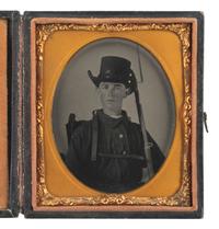 [CIVIL WAR]. Sixth plate tintype of armed soldier possibly representing North Carolina or Rhode Island.
