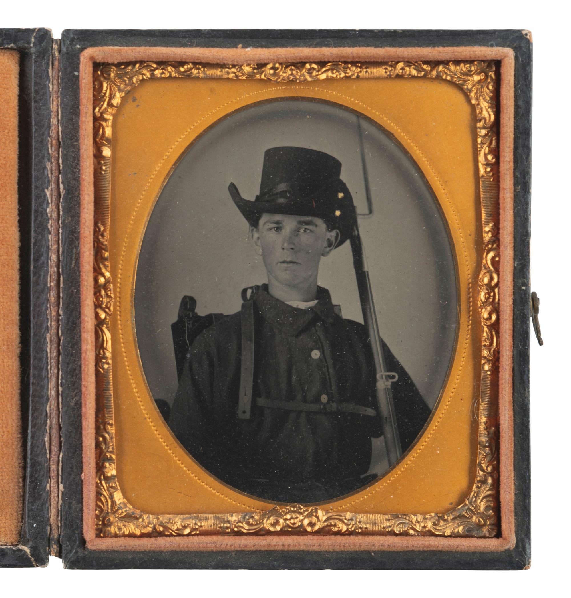 [CIVIL WAR]. Sixth plate tintype of armed soldier possibly representing North Carolina or Rhode Island.