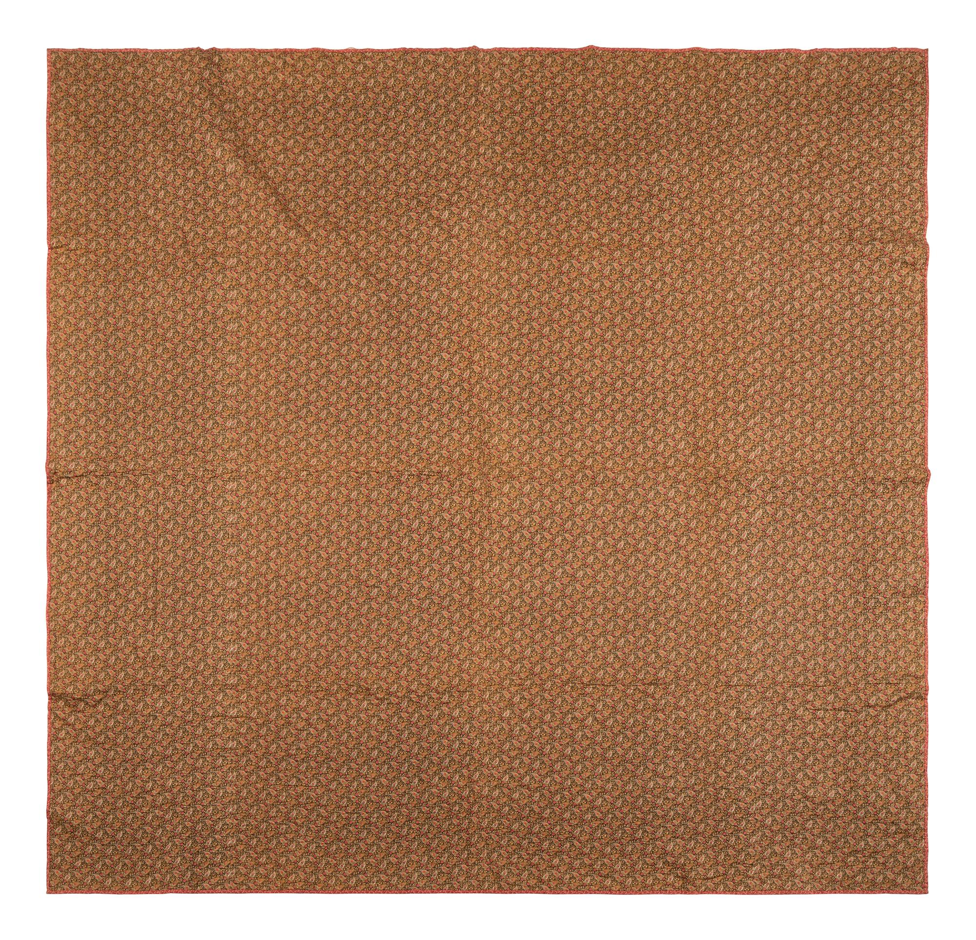 A Pieced Printed Cotton 'Eight Pointed Star' Variation Pattern Quilt