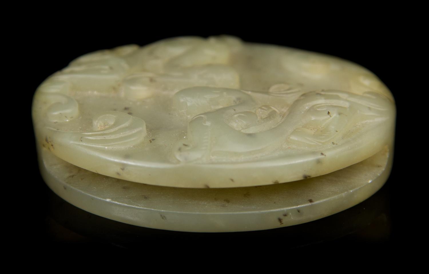 A Carved Jade Bi Diameter 2 1/4 inches.