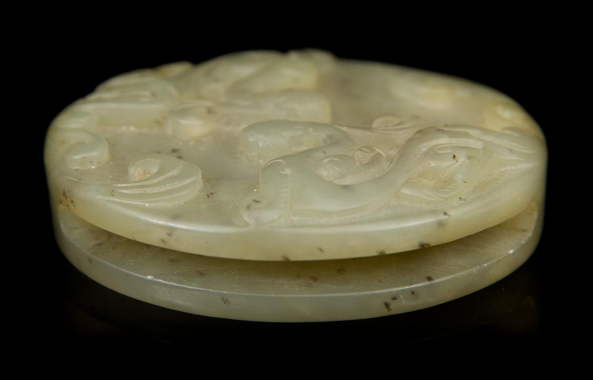 A Carved Jade Bi Diameter 2 1/4 inches.