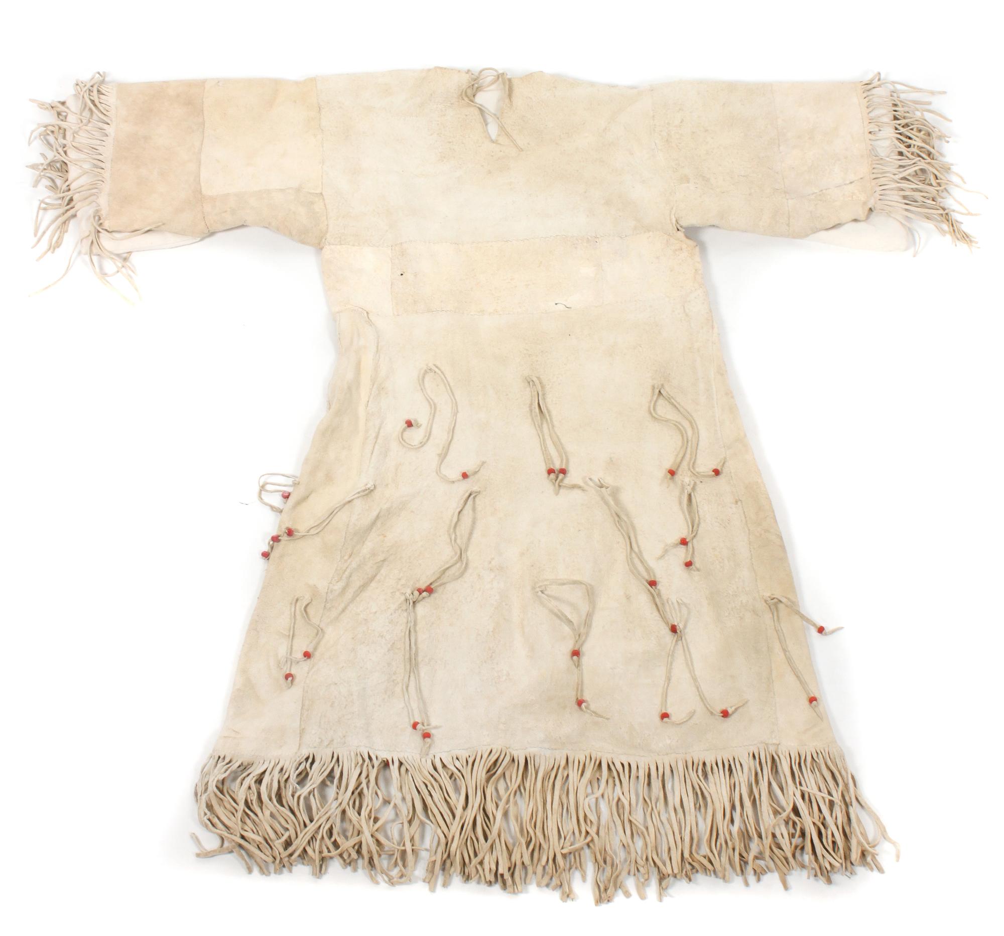 A Group of Plains/ Plateau Area Clothing Length of one dress 34 1/2 inches.
