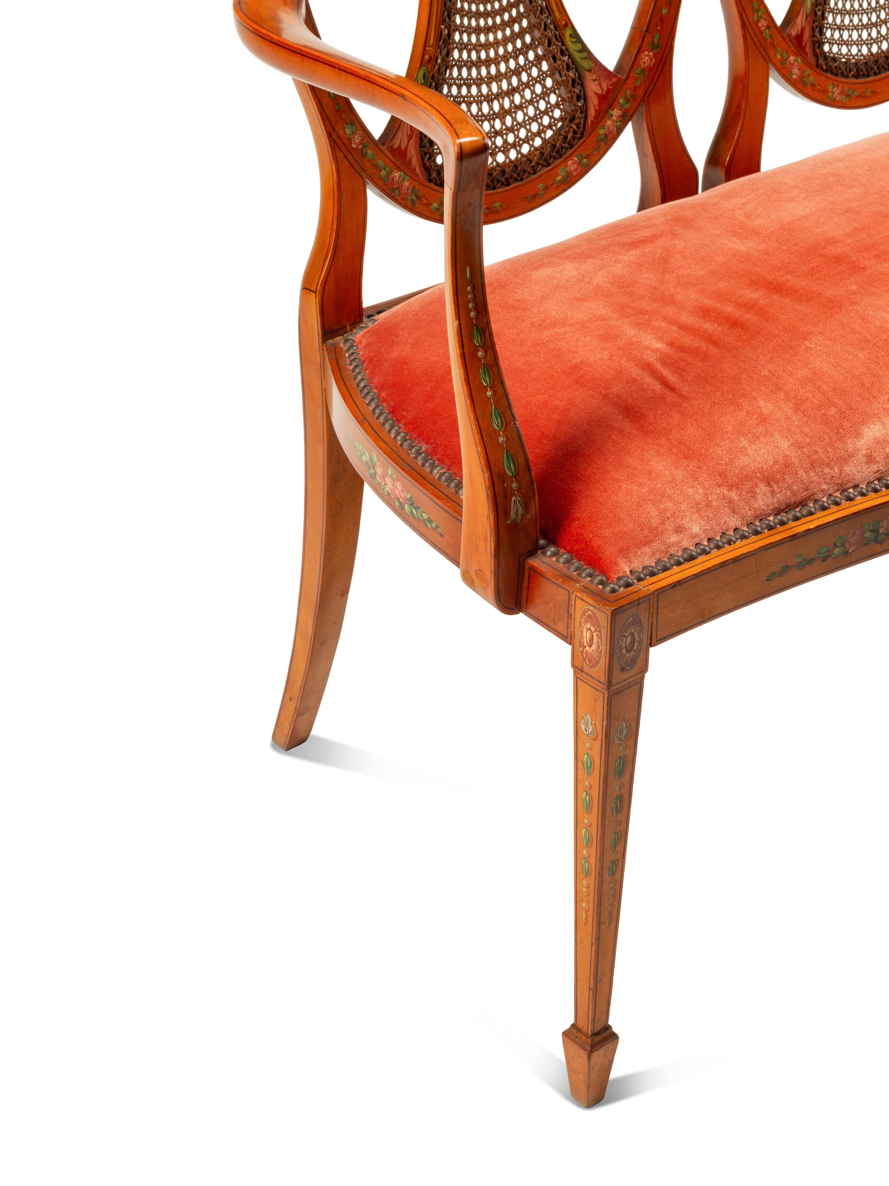 An Edwardian Painted Satinwood Settee