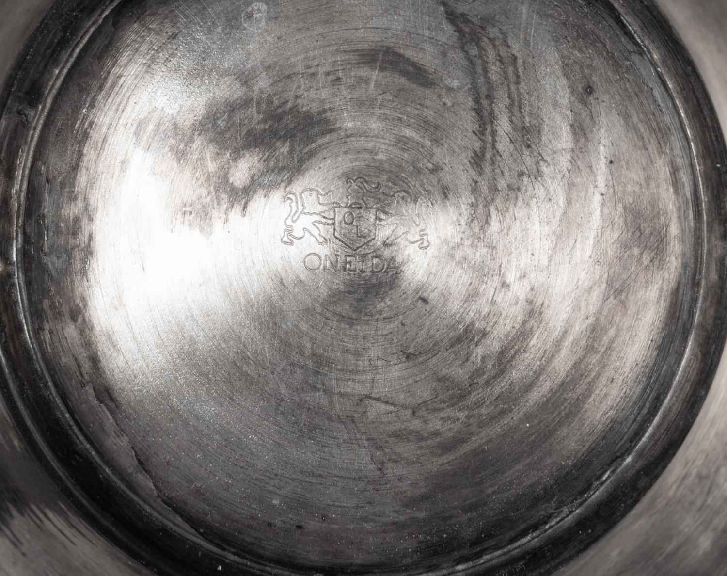A Silvered Metal Candle Stand