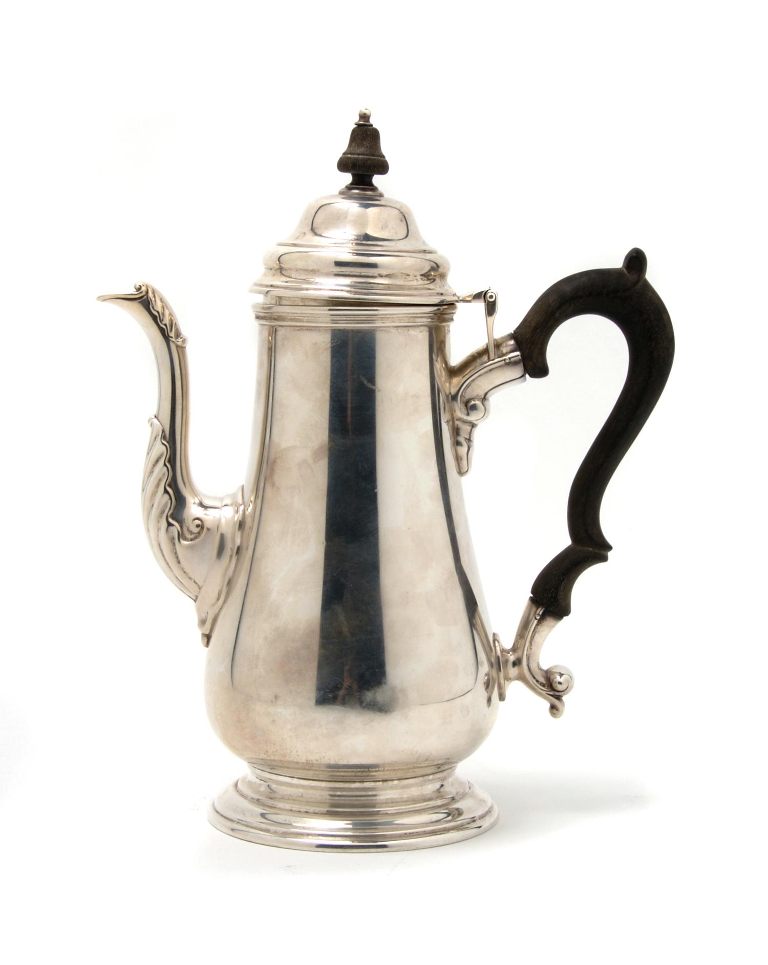 An American Sterling Silver Teapot, Height 10 1/2 inches.