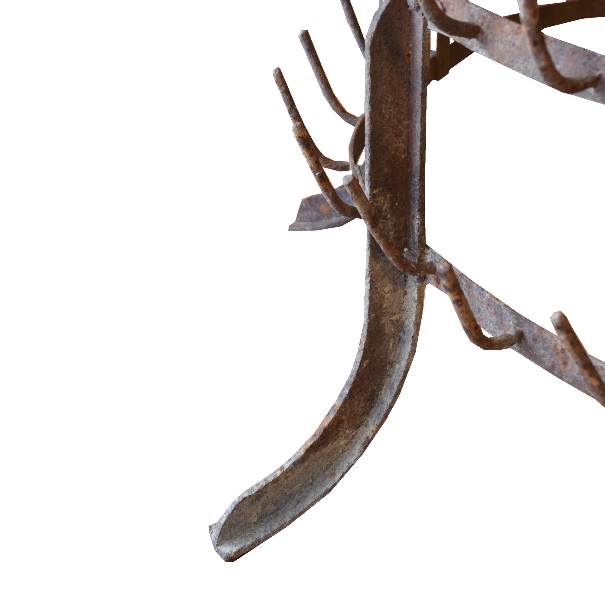 A Wrought Iron Bottle Rack 35" W x 35" D x 73" H — Italy, Circa 1920