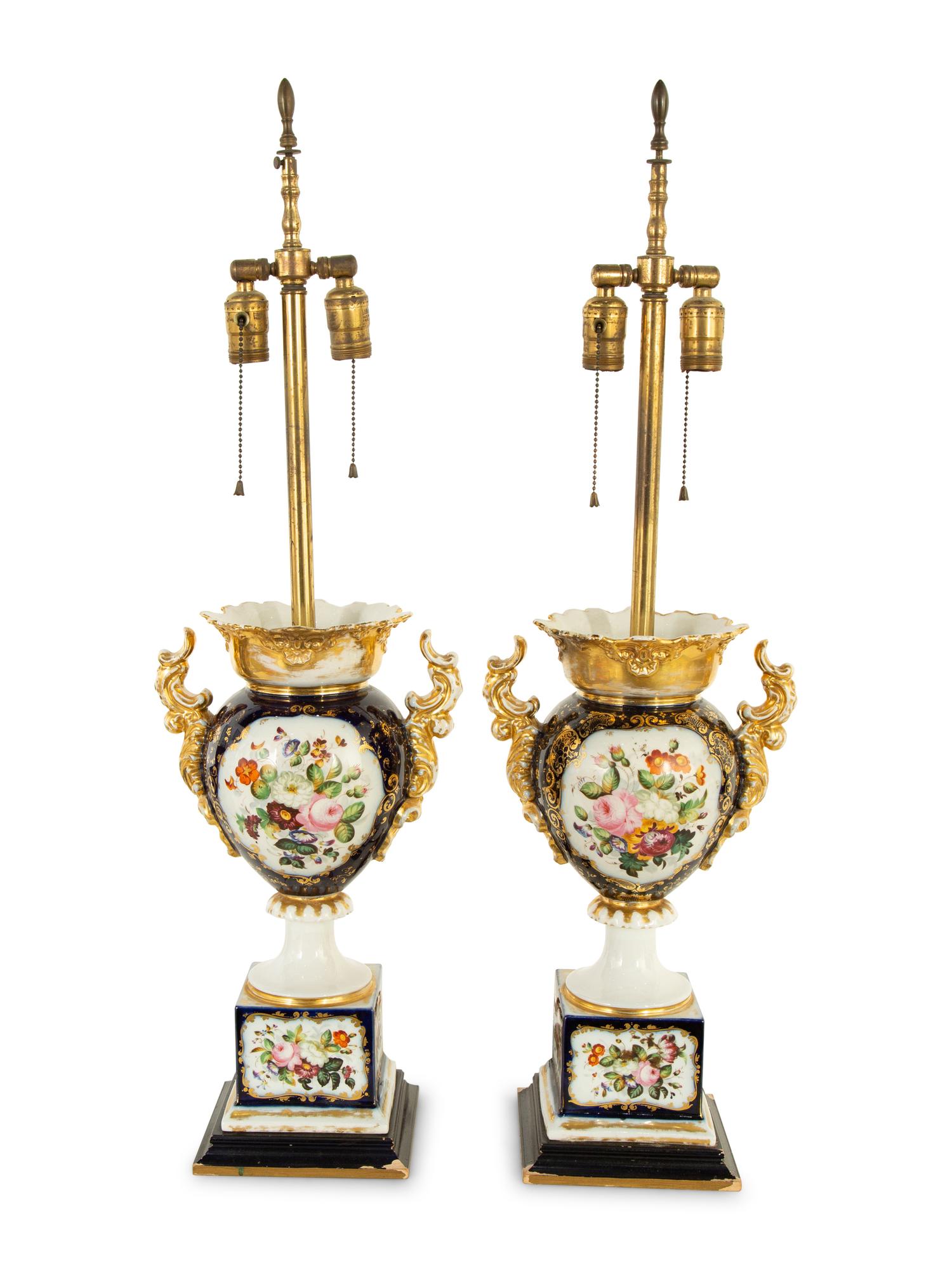 A Pair of French Porcelain Urns Mounted as Lamps
